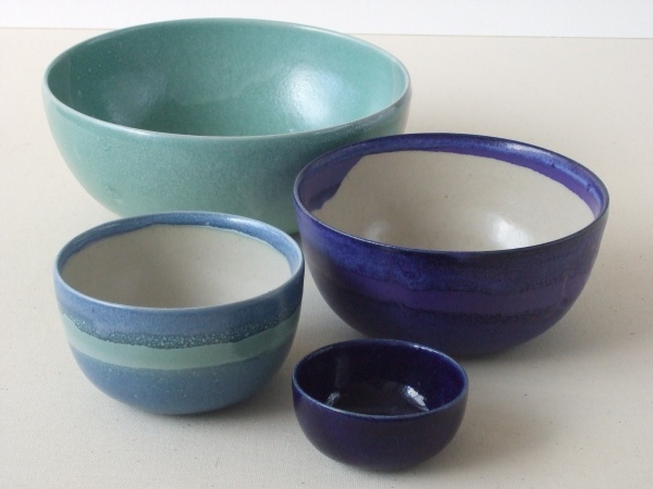 Nesting bowls in turquoise and deep blue glazes by Jane The Potter